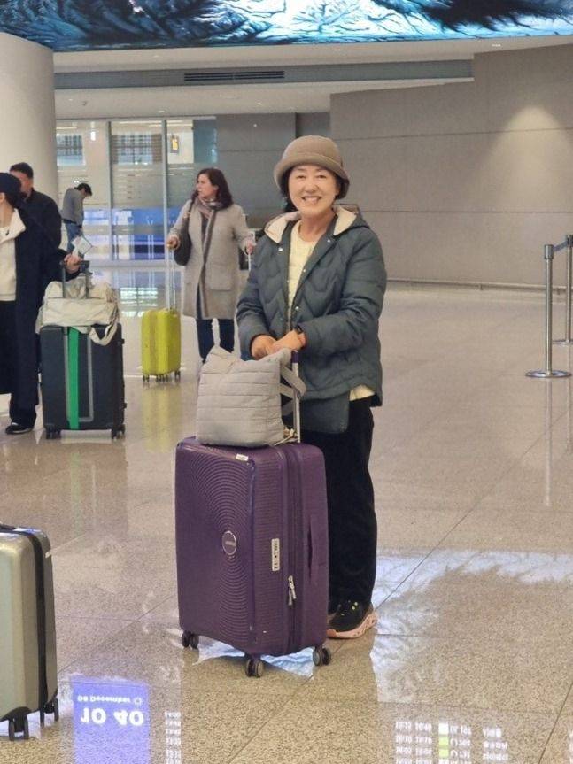 여행을 마치고 인천공항에 도착한 아내의 밝은 모습 ⓒ