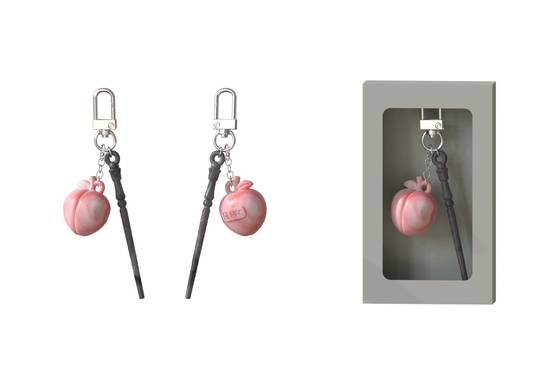 '쓸모'를 주제의식으로 하는 영화 '파과'의 굿즈 중 하나인 NFC 키링. 영화 속 등장하는 과일과 비녀를 키링으로 만들었다. NFC 키링을 제작한 브랜드는 '노플라스틱 선데이'. 휴대폰에 키링을 가져다 대면 운세를 확인하듯 '오늘의 쓸모'를 볼 수 있다. 사진 NEW