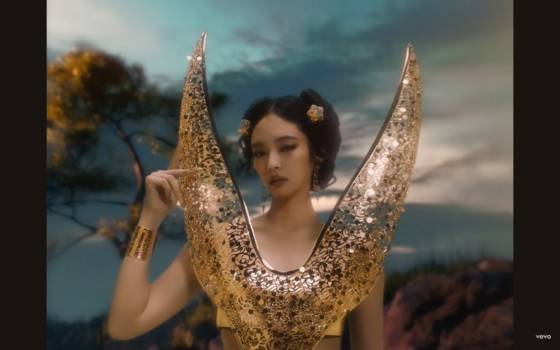 Jennie wears Leje's specially designed metallic top inspired by the presumed-crown worn by the  Korea's Silla Dynasty (57 BCE to 935 CE) female leaders in her music video of ″Zen″ released on Jan. 25.