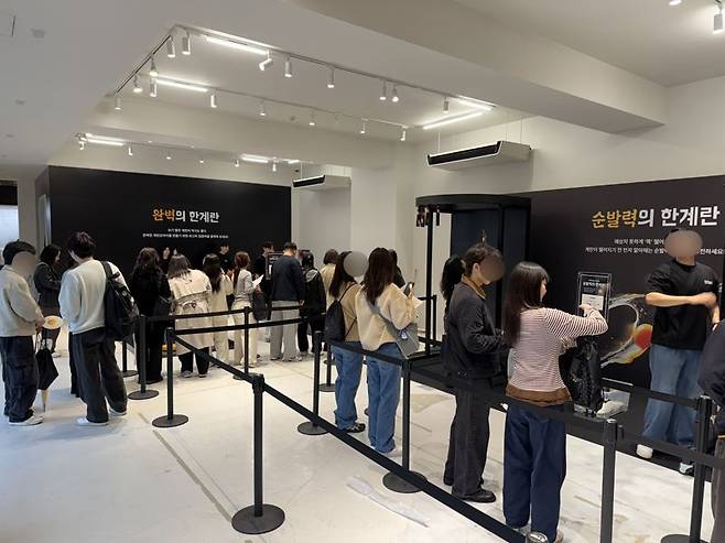지난 9일 서울 성동구 성수동 '배민프라이데이' 팝업 행사장안에 참가자들이 게임을 하기 위해 줄을 서고 있다. 사진=주원규 기자