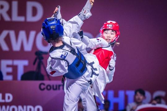 여자 29㎏급에서 금메달을 딴 오윤주(오른쪽)의 결승전 경기 모습. 사진[연합뉴스]