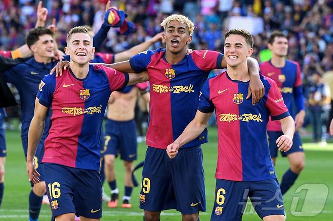 레알 마드리드를 꺾고 승리한 바르셀로나 ⓒ AFP=뉴스1