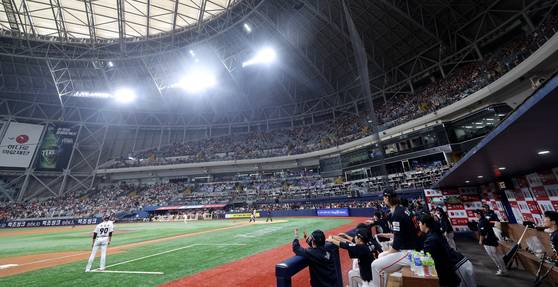 Fans watch a KBO game between the Hanwha Eagles and Kiwoom Heroes at Gocheok Sky Dome in western Seoul on May 11. [YONHAP]