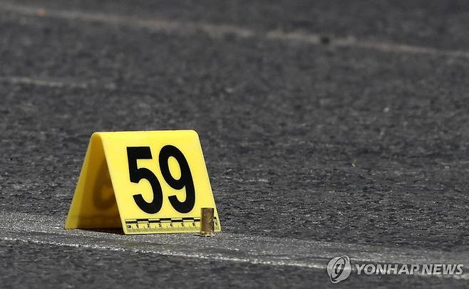멕시코 범죄현장 수사(기사와 직접적인 연관 없음) [사포판 AFP=연합뉴스. 재판매 및 DB 금지]