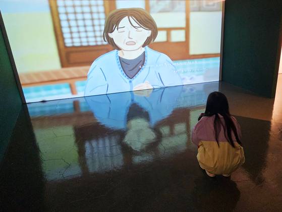 5·18민주화운동기록관 ‘소년이 온다’ 전시회 장면. 소설 속 장면을 애니메이션으로 제작했다.