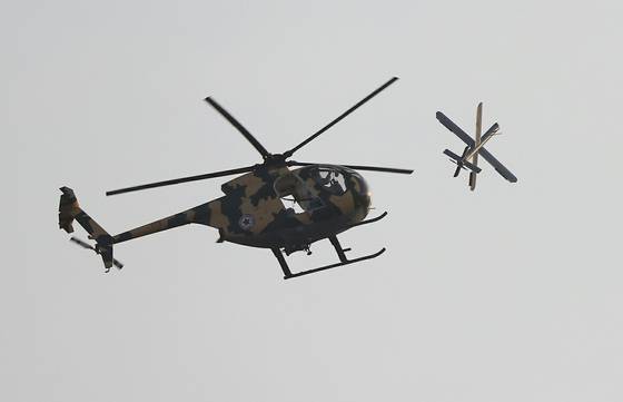 북한군 제1공군사단 예하 비행연대가 지난 15일 '헬기에 의한 적 무인기 정밀폭격 훈련'을 진행하는 모습. 노동신문, 뉴스1