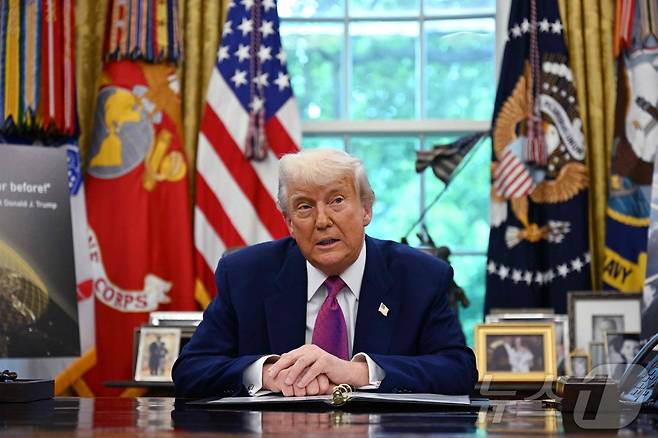 도널드 트럼프 미국 대통령이 20일(현지시간) 워싱턴 백악관에서 열린 '골든돔' 추진 계획 발표 행사서 "러시아가 핀란드 국경 근처에서 군사력 배치를 강화하고 있다는 일부 보도에 나는 전혀 걱정하지 않는다”고 밝히고 있다. 2025.05.21 ⓒ AFP=뉴스1 ⓒ News1 우동명 기자