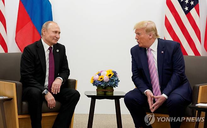 2019년 일본 오사카 G20 정상회의에서 만난 푸틴-트럼프 [로이터=연합뉴스 자료사진. 재판매 및 DB 금지]