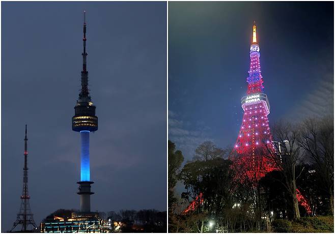 한·일 수교 60주년을 기념해 지난 2월 15일 서울 남산 서울타워(왼쪽)에 한국과 일본의 국기를 상징하는 파란색과 빨간색이 번갈아 비쳤다. 이날 일본 도쿄타워에도 일본과 한국을 뜻하는 영어인 ‘재팬 코리아’(JAPAN KOREA)가 점등됐다. [연합뉴스]