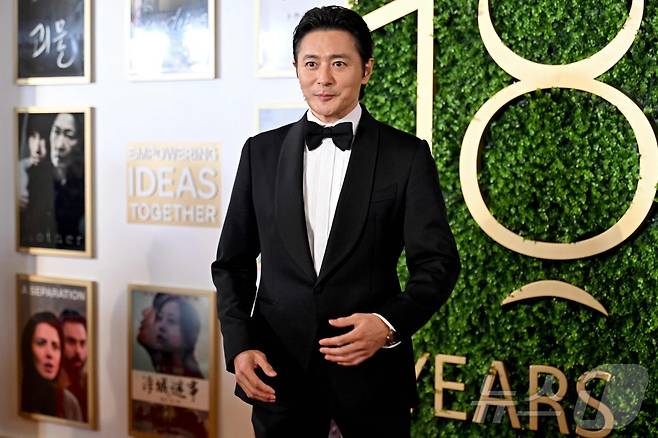 배우 장동건이 16일(현지시간) 홍콩에서 열린 아시아 필름 어워즈 시상식의 레드 카펫에 도착을 하고 있다. 2025.03.17 ⓒ AFP=뉴스1 ⓒ News1 우동명 기자