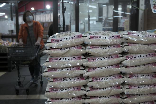 Bags of rice for sale at a Marusan supermarket in Koshigaya, Saitama Prefecture, Japan, on March 16. (Bloomberg)