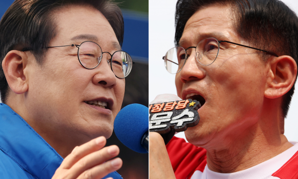 제21대 대통령 선거 사전투표 전날인 28일 이재명 더불어민주당 대선 후보가 서울 광진구 어린이대공원 정문 앞에서 열린 집중유세에서 지지를 호소하고 있다. 오른쪽은 김문수 국민의힘 대선 후보가 경남 양산시 이마트 양산점 앞에서 유세하는 모습. 2025.5.28 뉴스1