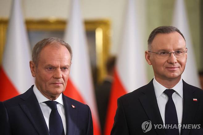 도날트 투스크 총리(왼쪽), 안제이 두다 대통령 [EPA 연합뉴스 자료사진. 재판매 및 DB 금지]