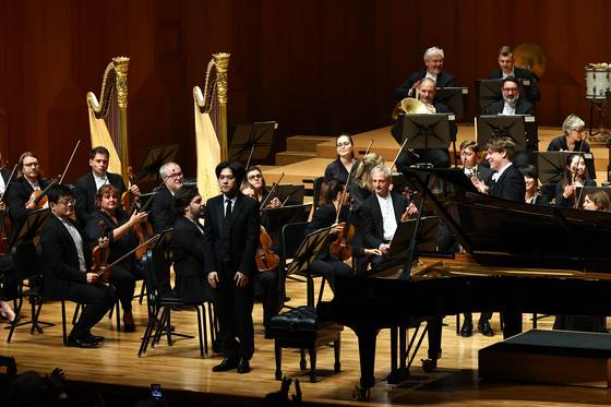 Pianist Yunchan Lim holds a concert at the Seoul Arts Center alongside the Orchestre de Paris and conductor Klaus Makela on June 10 for the 60th anniversary of the JoongAng Ilbo. [JOONGANG ILBO]