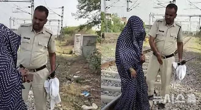 [뉴시스] 남편으로부터 폭언을 들은 인도의 한 여성이 아들과 함께 죽을 결심으로 철로에 앉아 기차를 기다렸다.  (사진=프리프레스저널) 2025.6.10