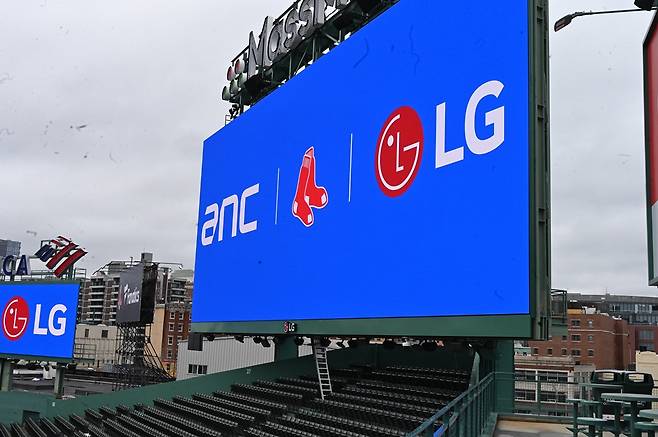 An LED scoreboard is installed by LG Electronics at Fenway Park, home of the Boston Red Sox. [LG ELECTRONICS]