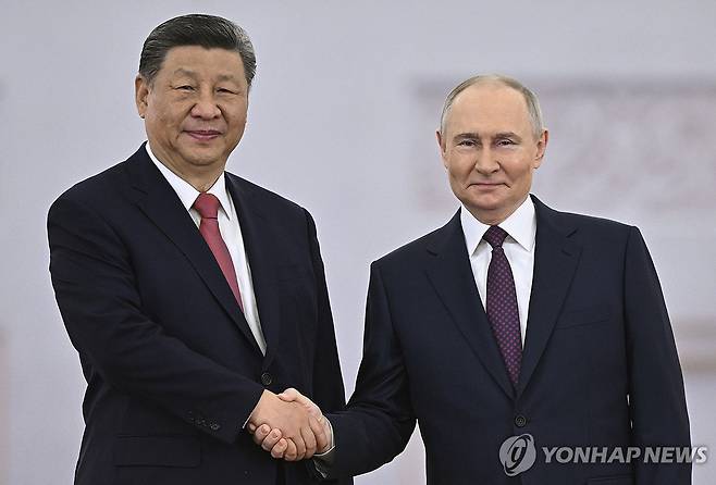 시진핑 중국 국가주석(왼쪽)과 블라디미르 푸틴 러시아 대통령 [연합뉴스 자료사진. 재판매 및 DB금지]
