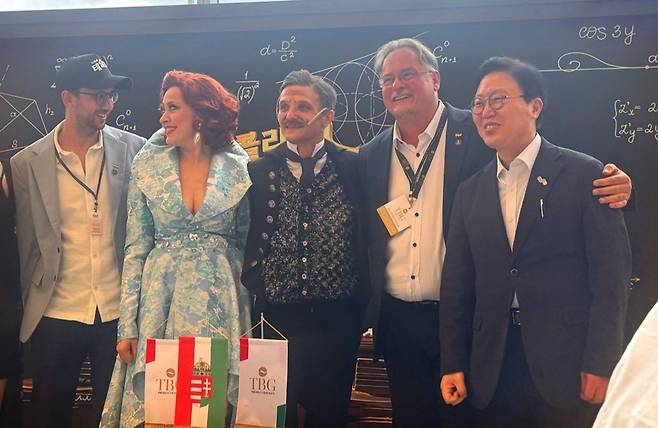 The creative team behind Hungarian musical "Nikola Tesla" and Bae Sung-hyuck (first from right), executive director of the Daegu International Music Festival, pose for photos during a press conference on Friday at the Daegu Opera House in Daegu. (Park Ga-young/The Korea Herald)