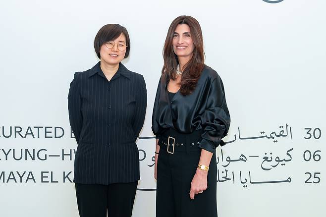 Yeo Kyung-hwan, curator at the Seoul Museum of Art (left) and Maya El Khalil, an independent curator based in the UK, pose for a photo at the press preview of the exhibition "Layered Medium: We Are In Open Circuits" on May 15. (ADMAF)