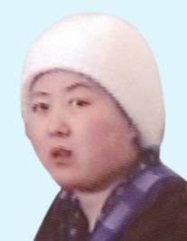 암 발병 이후 치료중일 때의 고용희. 탈모 영향인지 머리에 모자를 쓰고 있다. [문예춘추]