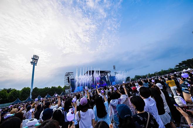 BTS fans, known as ARMY, cheer during Jin's performance at his first solo fan concert ″#RunSeokJin_EP.Tour″ at the Goyang Sports Complex Auxiliary Stadium in Gyeonggi on June 28. [BIGHIT MUSIC]