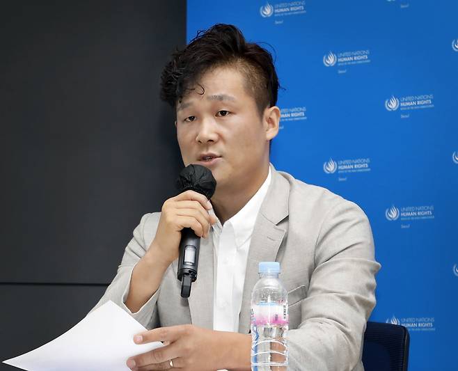 Defector Kim Il-hyuk, who escaped the North by boat in 2023, speaks during a public hearing hosted by the United Nations Human Rights Office in Seoul on Wednesday. [PARK SANG-MOON]