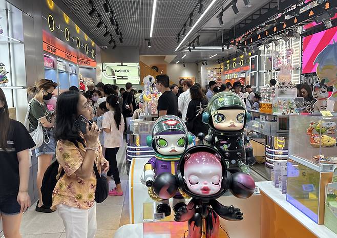 The Pop Mart store in Myeong-dong, central Seoul, is packed with people. [WOO JI-WON]