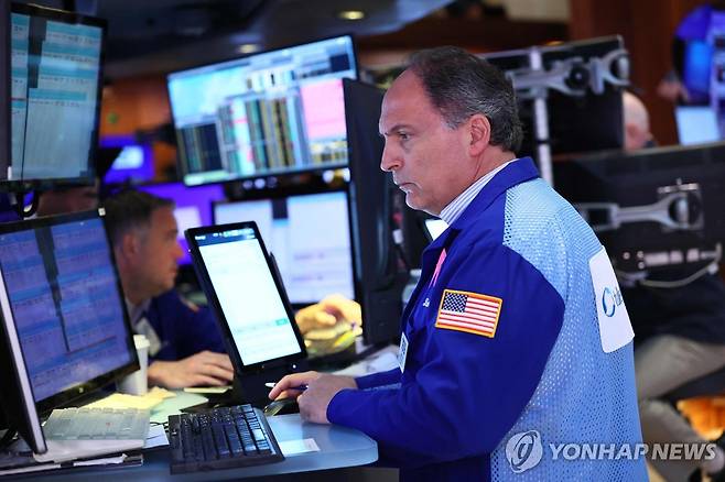 뉴욕증권거래소의 트레이더 [AFP 연합뉴스 자료사진. 재판매 및 DB 금지]