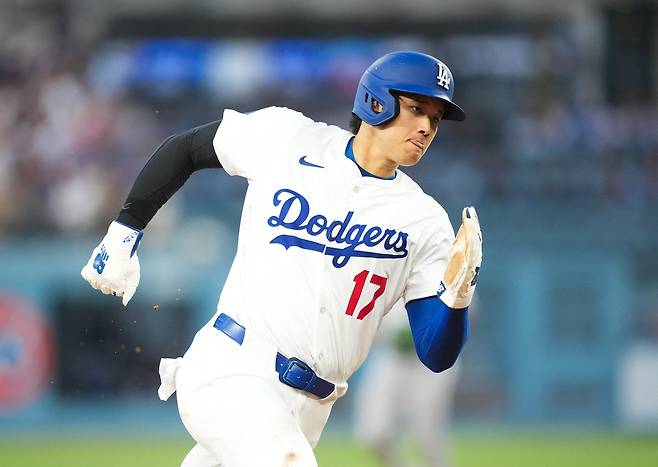 LA 다저스 오타니 쇼헤이가 4일 시카고화이트삭스전에서 3회말 프리먼의 안타에 3루를 돌아 홈으로 질주하고 있다. Imagn Images연합뉴스