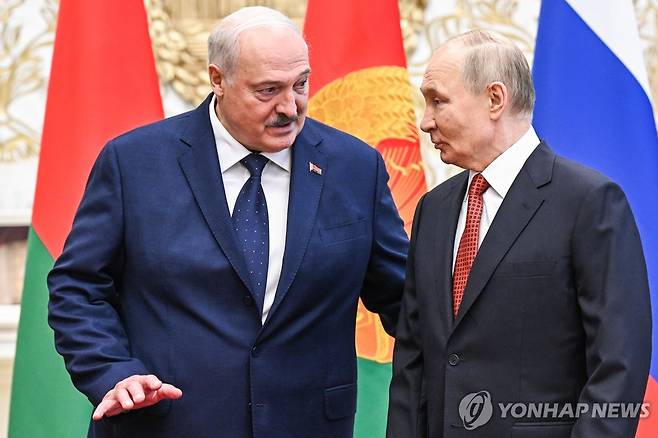 루카셴코 벨라루스 대통령(왼쪽)과 푸틴 러시아 대통령 [타스 연합뉴스 자료사진. 재판매 및 DB 금지]