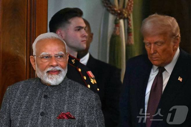 도널드 트럼프 미국 대통령이 13일(현지시간) 워싱턴 백악관에서 나렌드라 모디 인도 총리와 회담을 마친 뒤 기자회견에 도착을 하고 있다. 2025.02.14 ⓒ AFP=뉴스1 ⓒ News1 우동명 기자