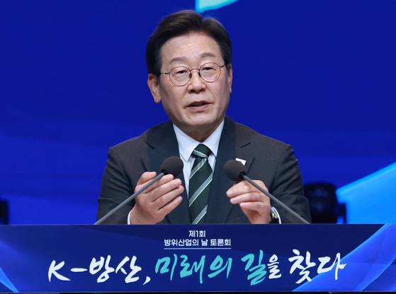President Lee Jae Myung speaks at an event to commemorate the inaugural K-Defense Day attended by leading Korean defense industry representatives and officials at Grand Hyatt Seoul hotel in central Seoul on July 8. [YONHAP]