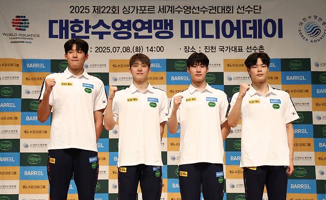 From left, swimmers Kim Young-beom, Kim Woo-min, Hwang Sun-woo and Lee Ho-joon pose for a photo at the Jincheon National Training Center in North Chungcheong on July 8. [YONHAP]