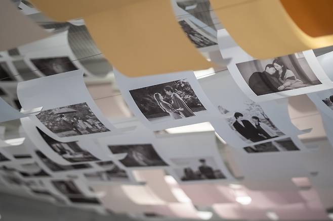 Photographs of famous scenes from Korean romance drama series are seen at the "K-Drama: Love Chapter" exhibition at Cheong Wa Dae Sarangchae in Jongno, central Seoul. (Korea Tourism Organization)