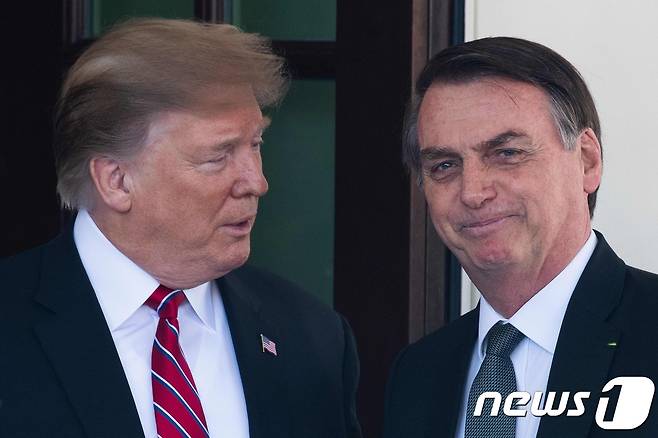 도널드 트럼프 미국 대통령(왼쪽)과 자이르 보우소나루  전 브라질 대통령. ⓒ AFP=뉴스1 ⓒ News1 우동명 기자