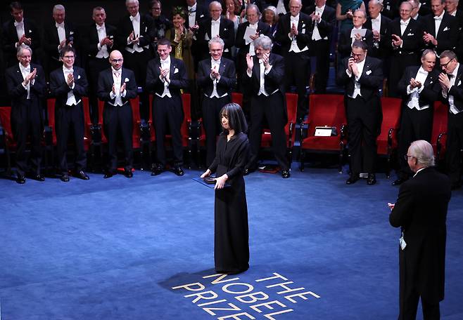 Novelist Han Kang receives the Nobel Prize in Literature from King Carl XVI Gustaf of Sweden during the 2024 Nobel Prize Award Ceremony at the Stockholm Concert Hall on December 10, 2024. [NEWS1]