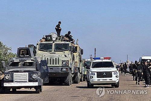 14일(현지시간) 시리아 남부 스웨이다에 배치된 군경 [SANA/AFP 연합뉴스 재판매 및 DB 금지]