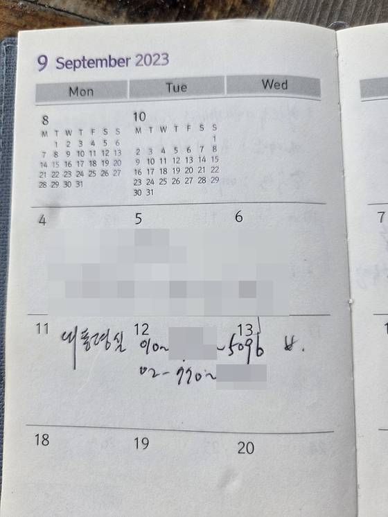 김건희 여사 일가의 양평고속도로 변경 종점 부근 소유 김충식씨 창고 주변에서 발견된 김씨의 다이어리 2023년 9월 달력란에 대통령실 휴대전화, 유선번호가 적혀있다. 열린공감TV 제공