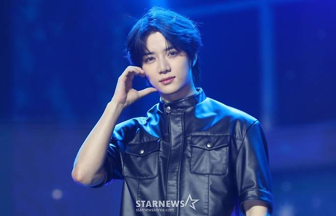 [서울=뉴시스] 김혜진 기자 = 그룹 투모로우바이투게더 범규가 21일 오후 서울 동대문구 경희대학교 평화의 전당에서 열린 네 번째 정규앨범 '별의 장: TOGETHER' 발매 기념 쇼케이스에서 포즈를 취하고 있다. 2025.07.21. jini@newsis.com /사진=김혜진