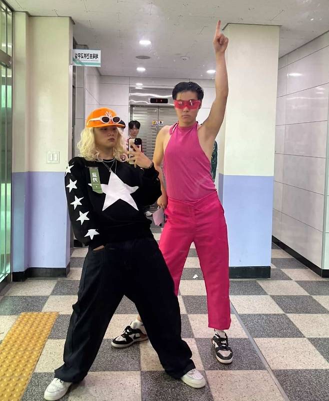 A student (left) dressed as dancer Kyoka from 'Street Woman Fighter,' and another as singer and producer Park Jin-young at the 2025 Waterbomb Music Festival. (Instagram)