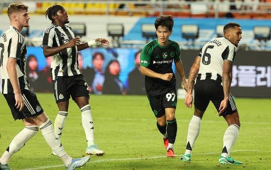 Team K League’s Kim Jin-gyu, center, celebrates after scoring in the first half of a Coupang Play Series game against Newcastle United at Suwon World Cup Stadium in Suwon, Gyeonggi on July 30.  [NEWS1]