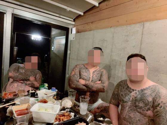 경찰에 검거된 리딩사기 조직원.