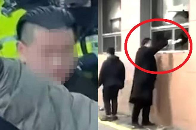 지난 1월19일 서울 마포구 서울서부지법에 침입한 일명&nbsp;‘투블럭남’이&nbsp;불 붙은 종이를 법원 내부로 던지고 있다. MBC 보도화면 캡처