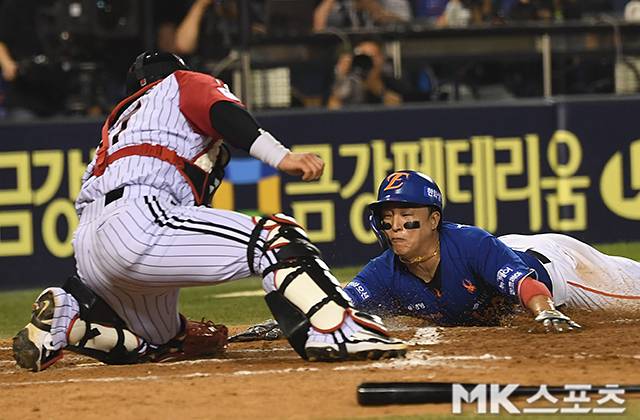 10일 오후 서울 잠실야구장에서 ‘2025 KBO리그’ 한화 이글스와 LG 트윈스의 경기가 열렸다. 7회초 1사 3루에서 한화 문현빈 땅볼 때 손아섭이 홈에서 세이프 되고 있다. 사진(잠실 서울)=천정환 기자