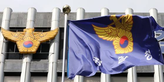 A police flag flutters in the wind at the National Police Agency's offices in Seodaemun District, western Seoul, on July 25, 2022. [NEWS1]
