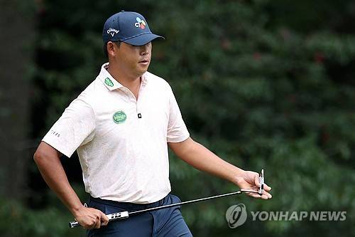 퍼팅을 준비하는 김시우. [AFP/게티이미지=연합뉴스]