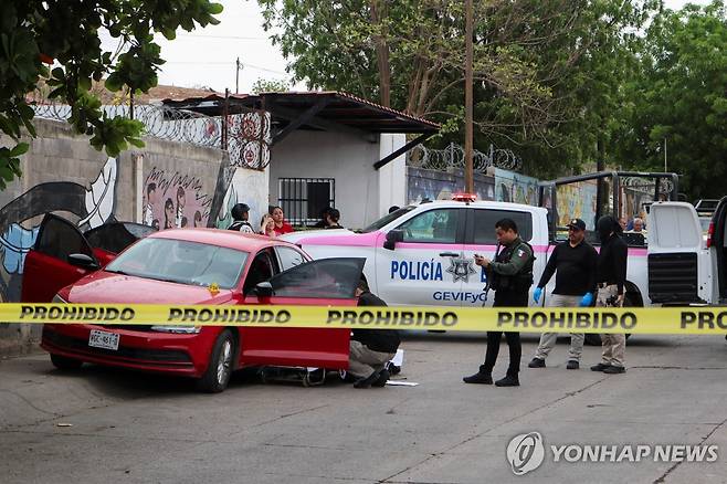 멕시코 범죄 현장의 경찰 [로이터 연합뉴스 자료사진. 재판매 및 DB 금지]