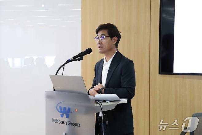 김종현 쿠콘 대표가 2025년 상반기 실적 및 향후 전략을 발표하고 있다.(쿠콘 제공)
