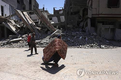 전쟁으로 폐허된 팔레스타인(기사 내용과 무관) [AFP 연합뉴스 자료사진. 재판매 및 DB 금지]