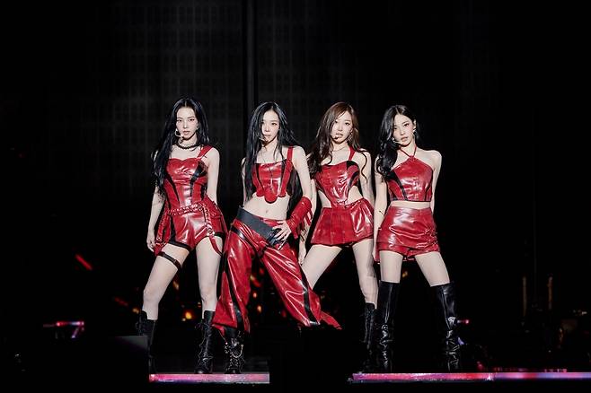 Aespa poses during its third concert, “2025 aespa Live Tour – Synk: Aexis Line,” at KSPO Dome in Seoul on Sunday. (SM Entertainment)